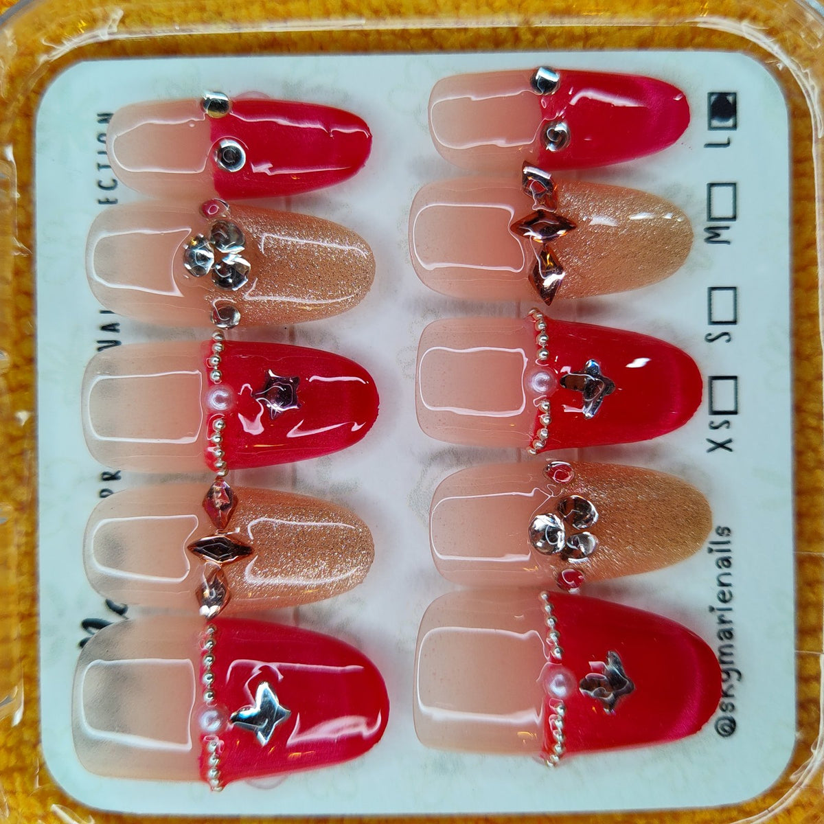 SkyMarie Handmade Large Red & Rose Gold French Tip Press-On Nails with Stars