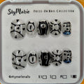 SkyMarie large press-on nails with abstract silver, black, and blue mystic cat-eye designs.