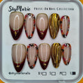 SkyMarie large press-on nails: red French tip, gold metallic wavy, and tortoise design with flakes.